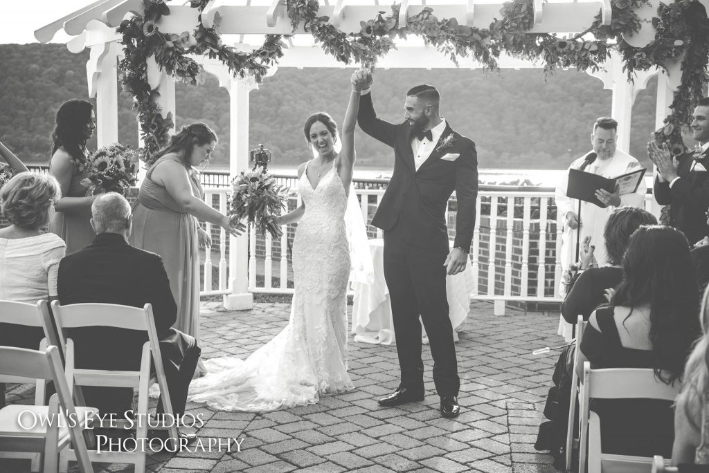 Bride and Groom celebrating at the alter after getting married